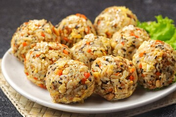 Korean rice balls or Jumeokbap (주먹밥) are a quick and easy snack or lunch made with leftover rice and various fillings that are shaped into a ball