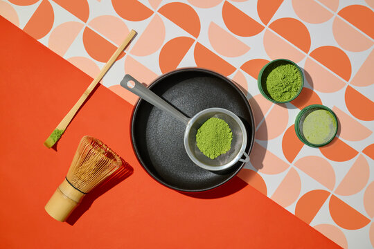 Matcha preparation tools, including a whisk and a bamboo spoon