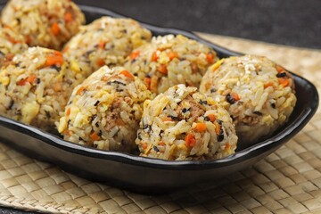 Korean rice balls or Jumeokbap (주먹밥) are a quick and easy snack or lunch made with leftover rice and various fillings that are shaped into a ball