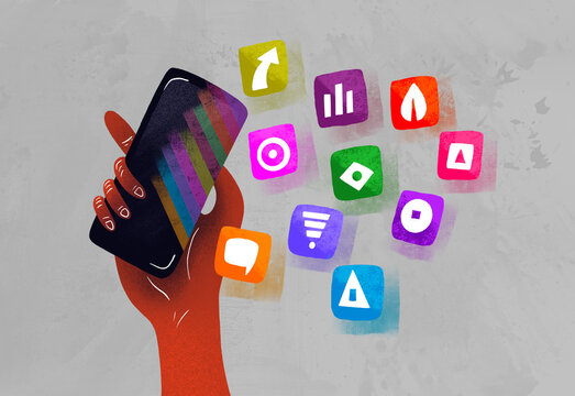Hand holding smartphone displaying colorful app icons 