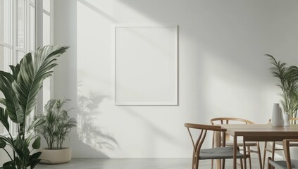 Empty white frame on white wall, bright sunlight, plants, dining set