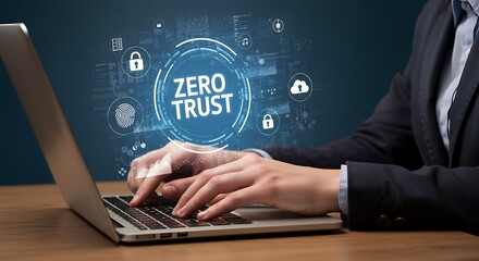 Person typing on a laptop with zero trust security concept displayed
