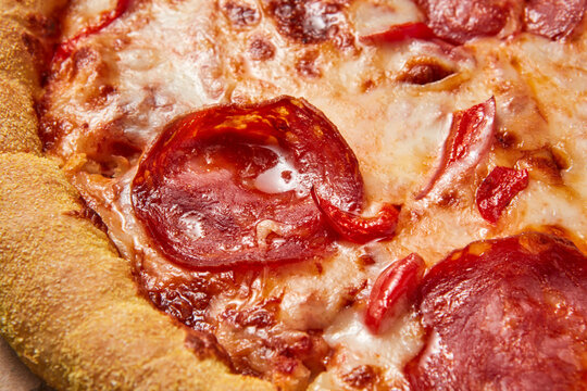Close-up of sausage and pepperoni pizza