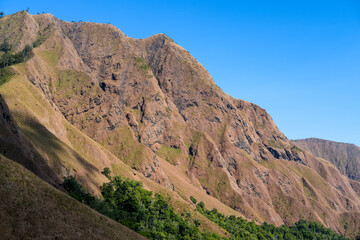 Beautiful mountain slopes captured on the scenic drive to Sembalun – Lombok, offering a glimpse...