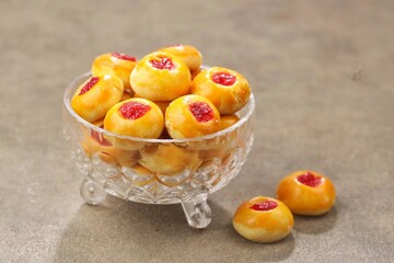 Thumbprint cookies are a method of making dry cakes by forming the cake into a round shape and then...