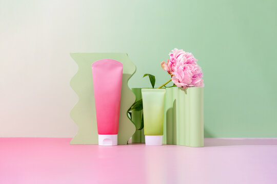 Colorful cosmetics display with floral accent in a modern settin