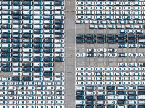 Aerial view new car distribution center parking lot