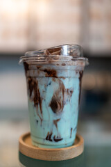 Glass of tasty viral iced chocolate mint drink.