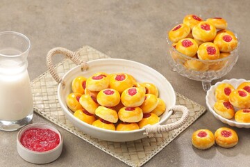 Thumbprint cookies are a method of making dry cakes by forming the cake into a round shape and then pressing the center with your thumb
