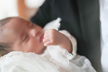 In June 2025, a Japanese couple in their early twenties brings their one-month-old baby to a shrine...