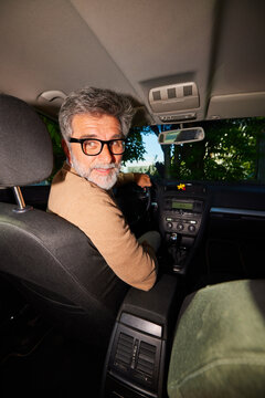 Man is driving in reverse