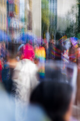 portrait shot of gathering of people at lgbt pride march at bogot&aacute; colombia taken at slow shutter speed
