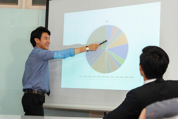Motivated professional team members gathered together at corporate seminar raise hand, agree with...