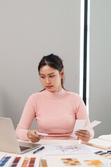 Obraz premium Asian Young Woman UI UX Designer Working at Desk With Laptop Creative Design Inspiration User Interface Project Design Workplace