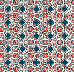 Festive Circular Pattern with Red and Green Elements on Blue Background
