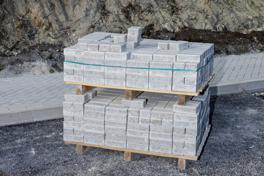 Stack of paving stones for the new sidewalk