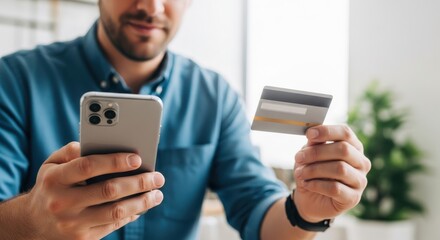 Modern Businessman Uses Smartphone and Credit Card for Online Payments and Mobile Banking Transactions