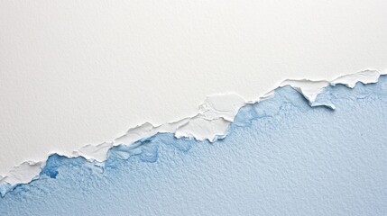 Obraz premium Torn Paper with Blue Watercolor Wash.