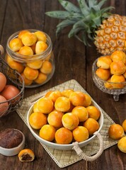 Nastar is a dry cake made from a mixture of wheat flour, butter and eggs filled with pineapple jam