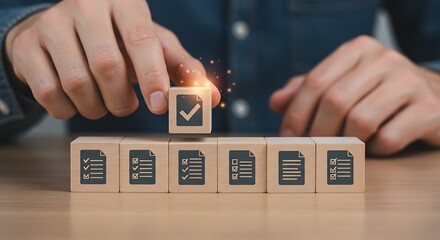 A hand places a checklist cube on top of other document cubes