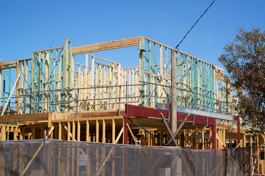 New building under construction showcasing wooden frame