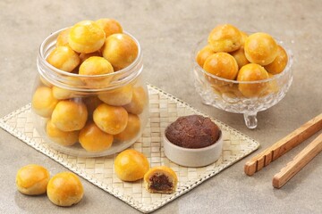 Nastar is a dry cake made from a mixture of wheat flour, butter and eggs filled with pineapple jam