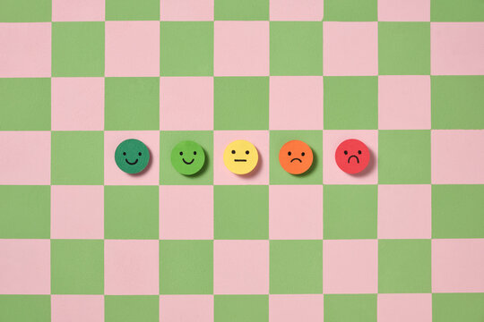 A checkerboard displaying a range of emoji faces