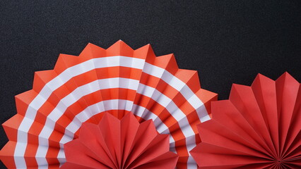 Independence Day Indonesia banner mockup with Indonesia flag color paper fans isolated on black background