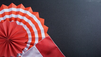 Independence Day Indonesia banner mockup with Indonesia flag color paper fans and flag decoration isolated on black background