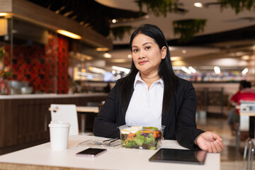 Portrait of a Asian woman in a restaurant