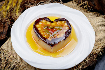Wedding dessert glutinous rice eight-treasure rice pudding on a white porcelain plate