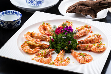 Fried king prawns on a black background