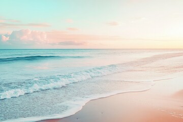 Pastel sunset over a tranquil beach. Gentle waves wash ashore a soft, sandy beach at sunrise or sunset, with pale pink and teal colors blending harmoniously in the sky