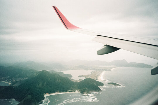 Aerial View of Rio de Janeiro Coastline from Plane Window
