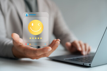 customer satisfaction, Customer giving five-star rating with smiling emoji on digital interface, representing excellent user experience, service feedback, online review, and brand loyalty.