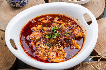 Spicy boiled beef in blue and white porcelain plate