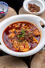 Spicy boiled beef in blue and white porcelain plate