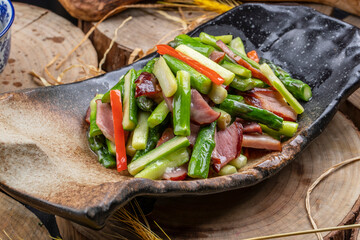 Asparagus fried with bacon