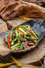 Asparagus fried with bacon