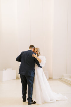 Bride and Groom indoors dancing