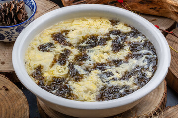 Seaweed and egg soup in a white porcelain bowl