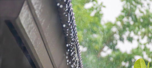 rain falling down from the house roof