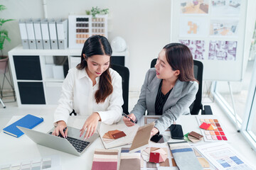 Asian Interior Designers Collaboration on Laptop for Home Renovation Project Adult Women Architects...