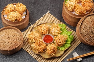 Udang Rambutan. Rambutan Shrimp is a type of fried dimsum, ball-shaped and filled with chopped chicken and shrimp.