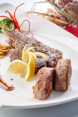 French foie gras and sizzling sirloin steak served in exquisite tableware