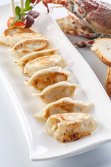 Grilled dumplings served on a plate