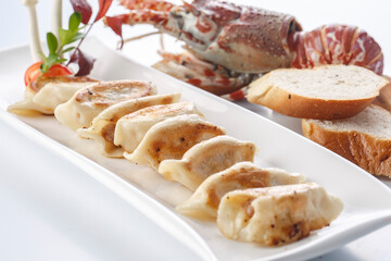 Grilled dumplings served on a plate