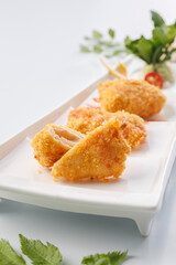 Golden fried chicken steak served in exquisite tableware
