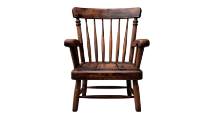 Antique wooden armchair with spindle back and arms presented against a stark black background