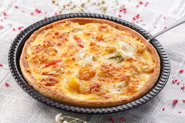 Freshly baked Western-style pizza served in exquisite tableware